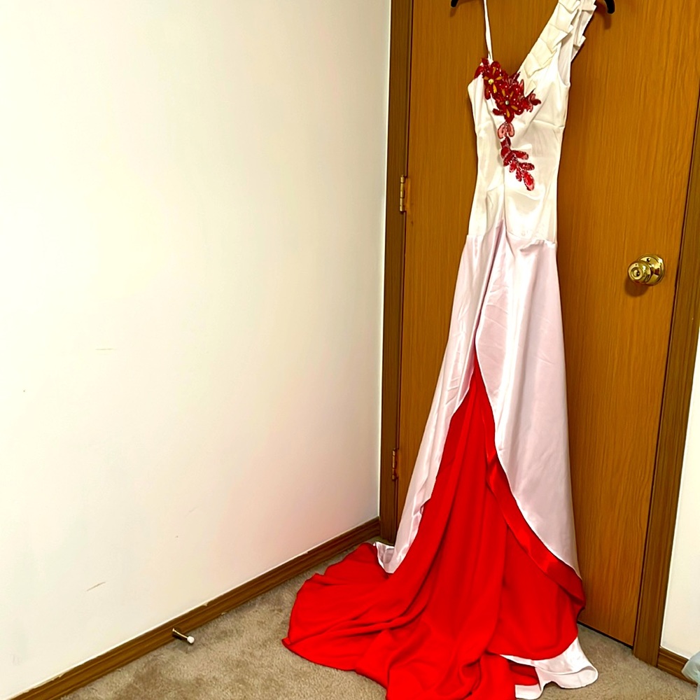 An evening long dress, elegant satin material, size 3 junior.